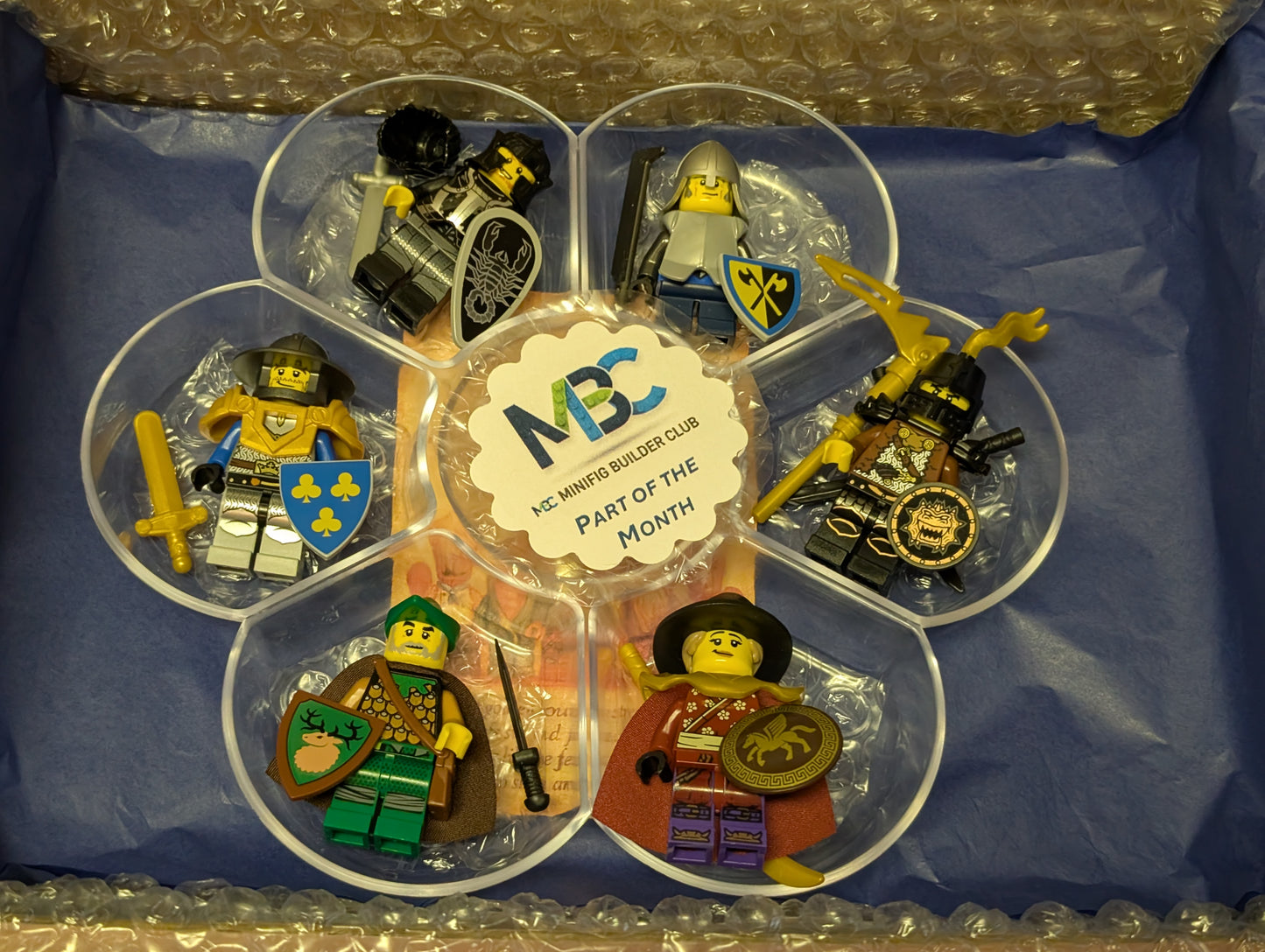 Minifig Builder Club Castle Heroes box with 6 LEGO minifigures